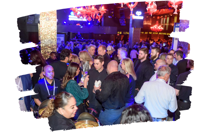A photo of a crowd of people at a Channel Partners networking event.